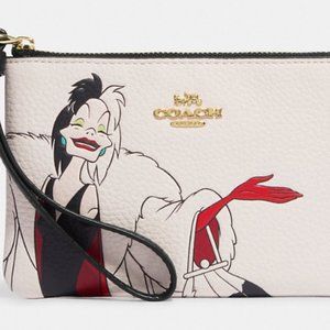 Disney X Coach Corner Zip Wristlet With Cruella Motif